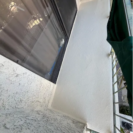 balcony repair project, renovated balcony exterior, balcony restoration before and after, apartment balcony repair, exterior renovation work, Encino California building exterior, professional construction team, exterior remodeling project