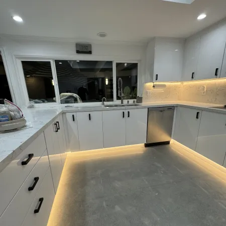 kitchen remodeling in Tarzana, full kitchen renovation Tarzana, European frameless kitchen cabinets, quartz countertop installation Tarzana, custom kitchen cabinet remodel, modern kitchen cabinets Tarzana, white European kitchen cabinets, quartz backsplash installation, under-cabinet lighting for kitchens, toe kick lighting ideas, kitchen cabinet remodeling in Tarzana, CA, best kitchen remodel contractors Tarzana, Tarzana kitchen renovation experts, custom kitchen cabinets in Tarzana, local kitchen remodeler in Tarzana, contemporary kitchen design ideas, durable quartz countertops for kitchens, frameless cabinet installation services, minimalist kitchen renovation styles, kitchen lighting installation tips