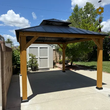 Transforming Outdoor Living with a Elegant Pergola Assembly