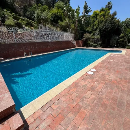 pool replaster before and after, swimming pool renovation, modern backyard pool, pool resurfacing project, outdoor living space, California pool remodeling