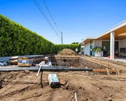 Modern Backyard Pool Construction by Caspi Construction