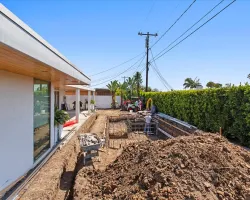 Modern Backyard Pool Construction by Caspi Construction