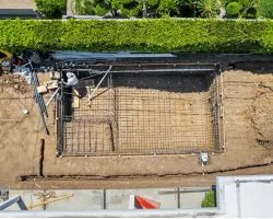 Modern Backyard Pool Construction by Caspi Construction