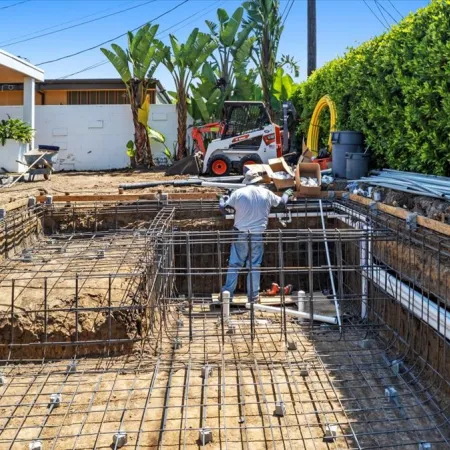 Modern Backyard Pool Construction by Caspi Construction