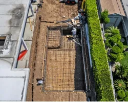 Modern Backyard Pool Construction by Caspi Construction