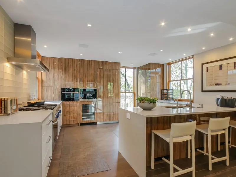 kitchen renovation, kitchen design, workflow, kitchen triangle, efficient layout, galley kitchen, L-shaped kitchen, U-shaped kitchen, countertops, cabinets, quartz countertops, solid wood cabinetry, flooring options, porcelain tiles, engineered hardwood, lighting, task lighting, ambient lighting, under-cabinet lighting, custom cabinetry, smart storage solutions, pull-out shelves, corner cabinets, drawer dividers, backsplash designs, color schemes, smart appliances, home automation, kitchen technology, personalizing your space, Caspi Construction